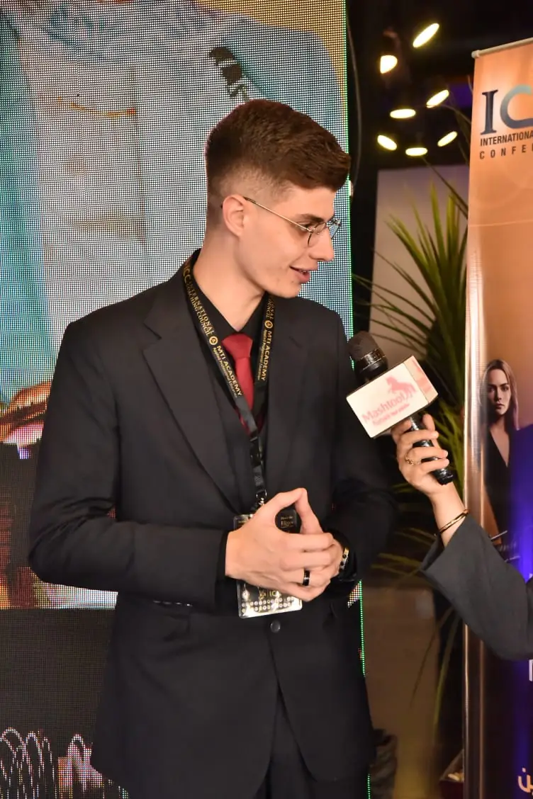 Ahmad Chammas backstage with media